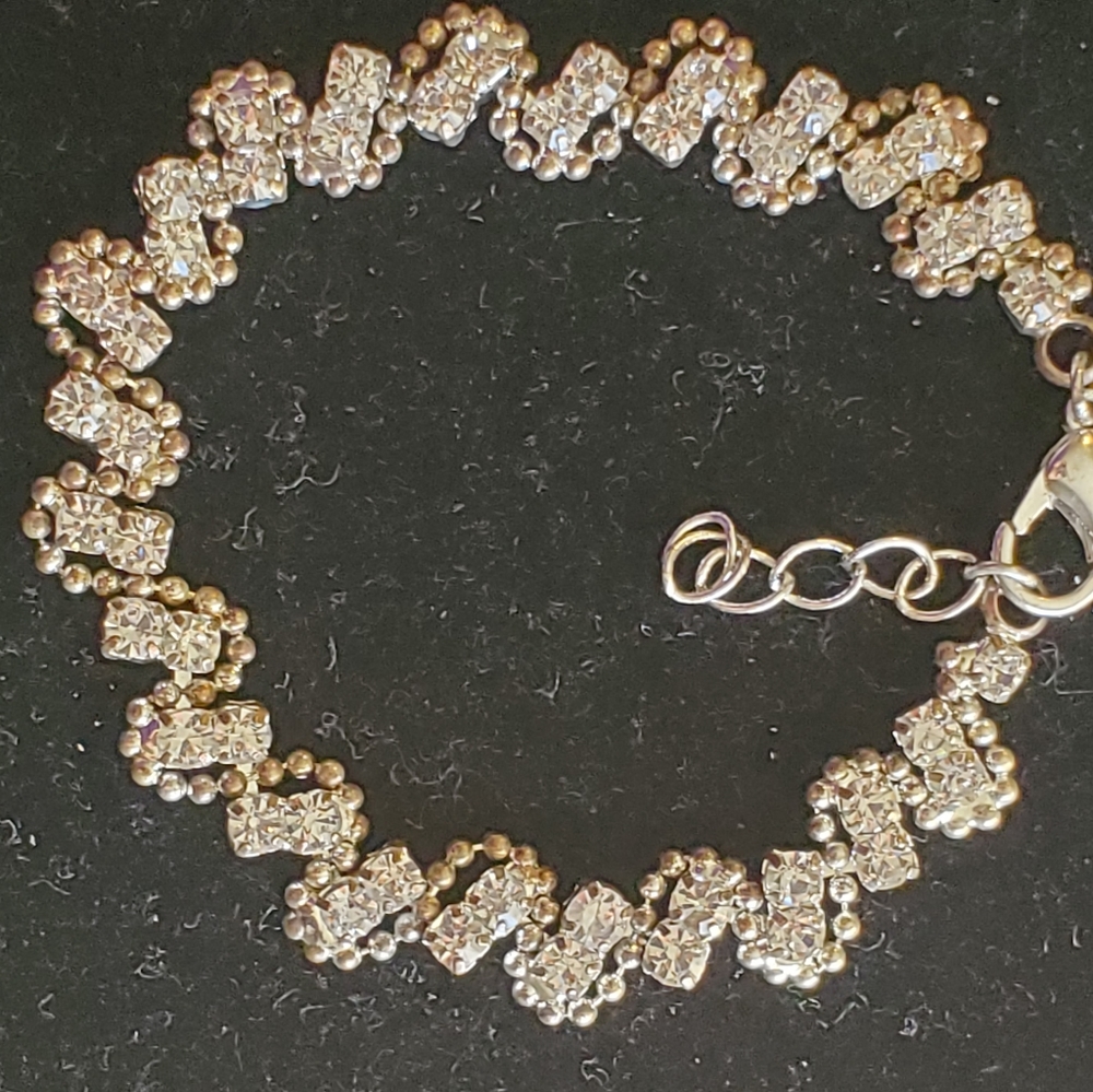Silvertone double rhinestones tennis bracelet adjustable